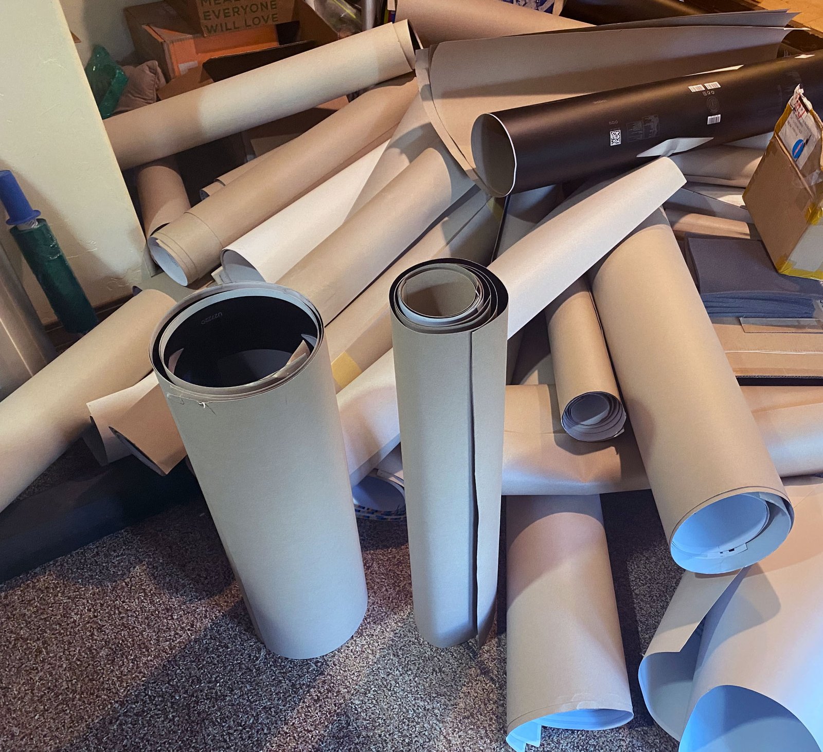 Color check substrate samples — rolled paper and material swatches for press verification